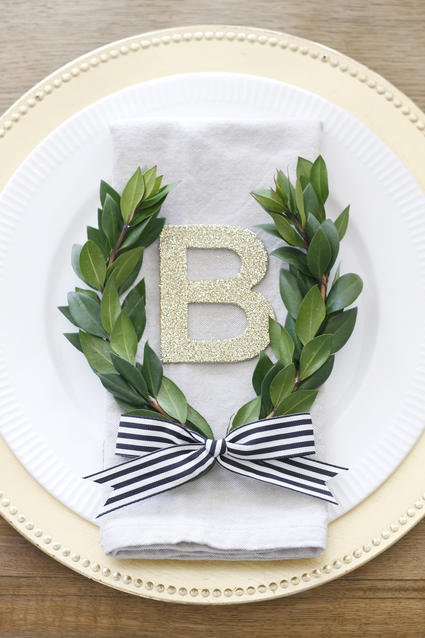 french garden tablescape monogram laurel