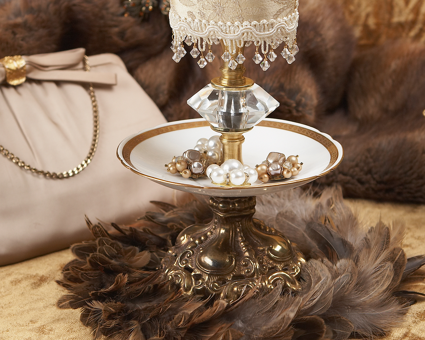 Jewelery holder figurine in cream outfit detail shot